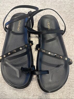 NEW - never worn bebe Black Studded Strappy Flat Sandals